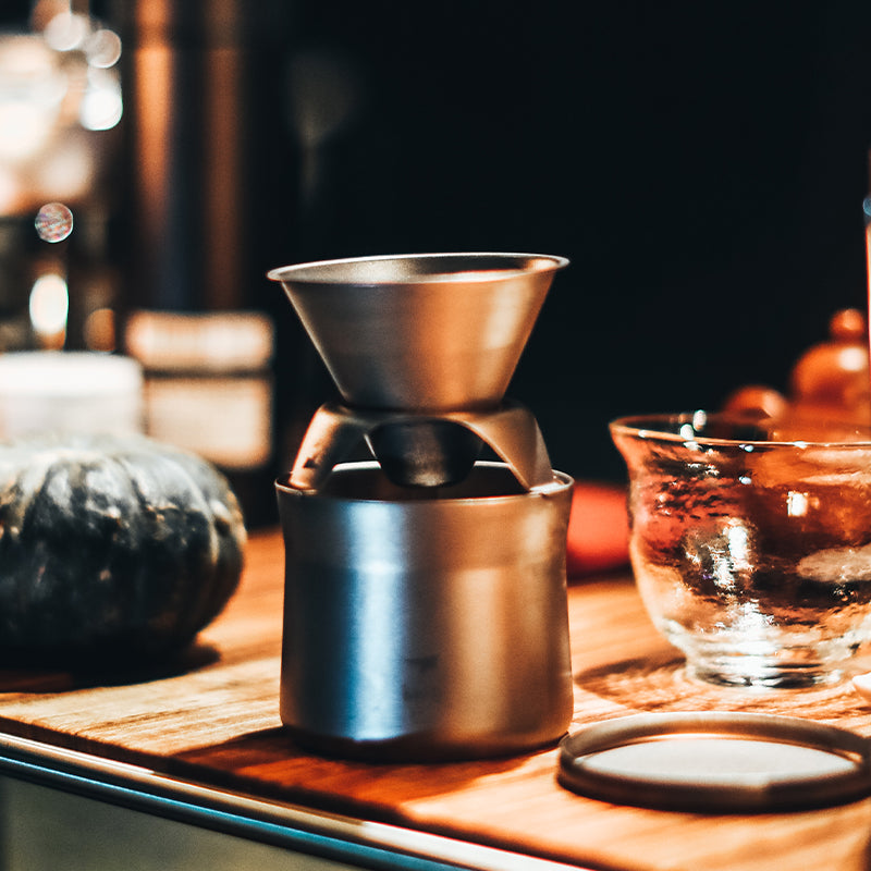 Keith Titanium Ti3911 titanium coffee dripper set assembled on a wooden table