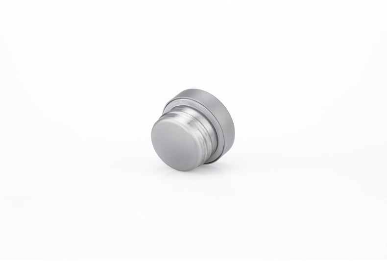 Keith Titanium Ti3030 and Ti3032 titanium bottle lid lying on its side on a white background