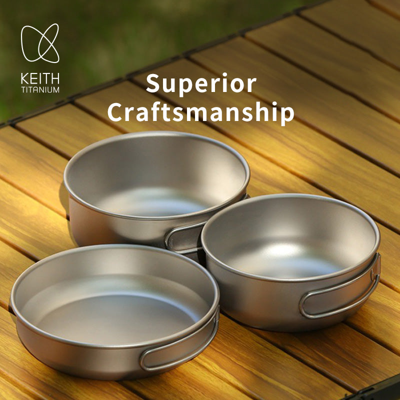 Keith Titanium Ti6053 three-piece cook set arranged on a wooden camp table