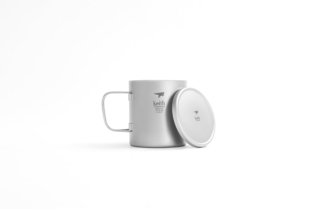 Keith Titanium Ti3353 double-wall mug with folding handle and detached lid on a white background