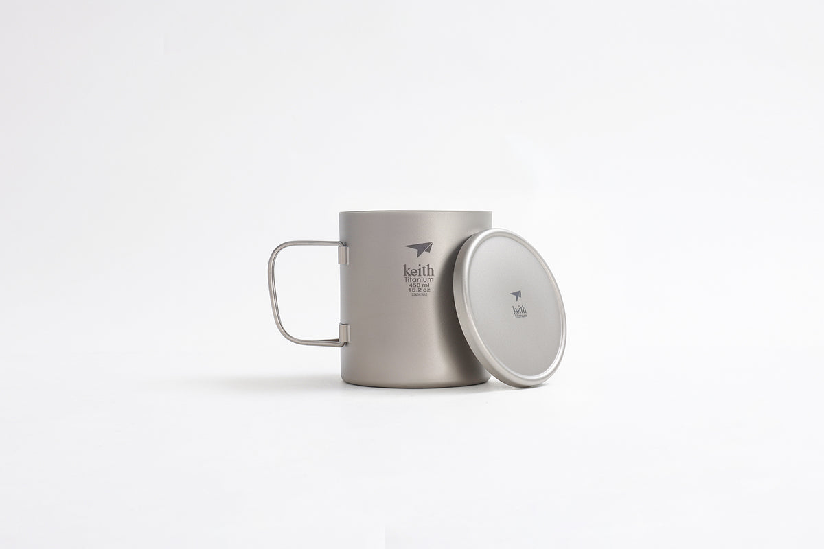 Front view of the Keith Titanium Ti3353 mug with folding handle and detached lid on a white background