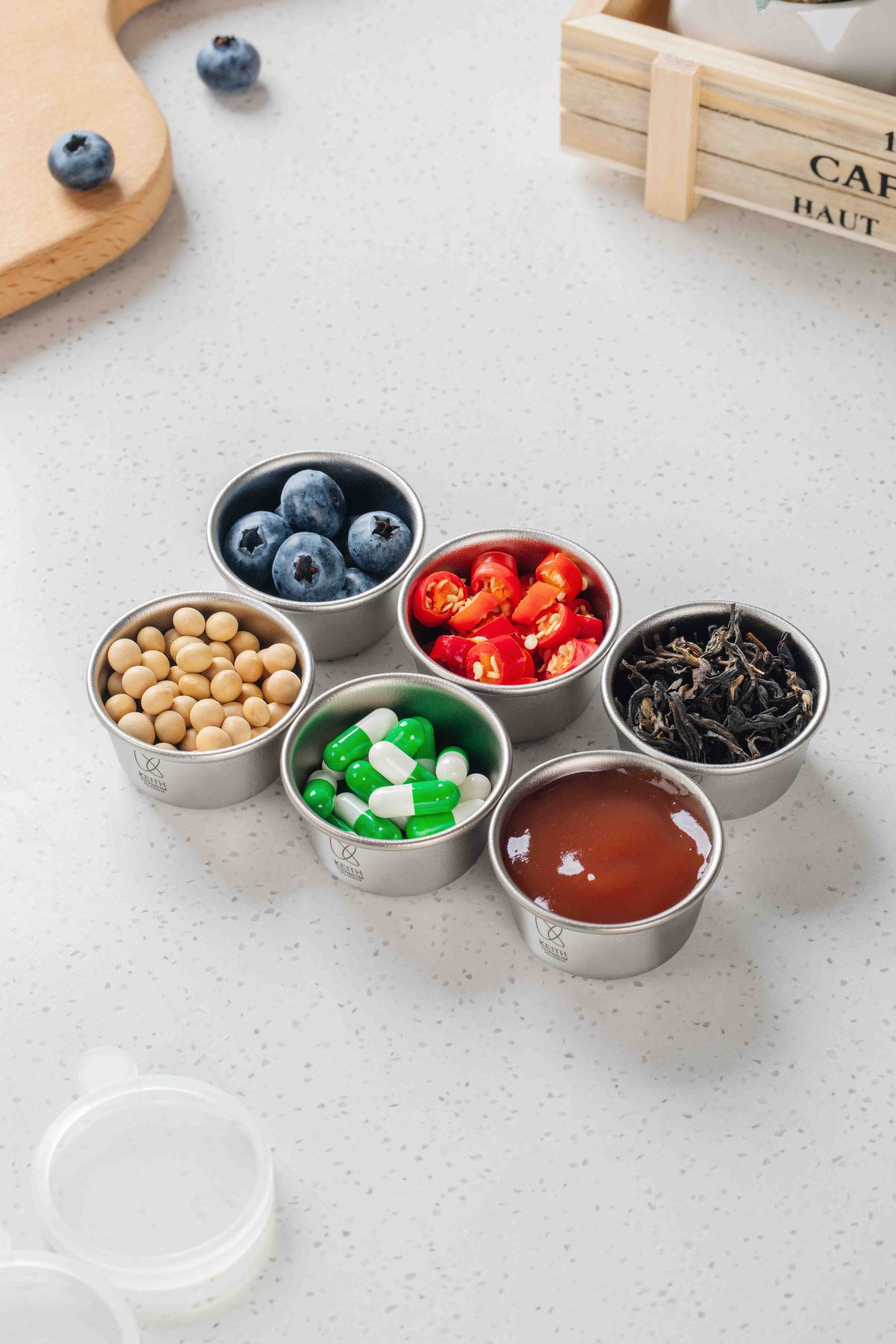 Keith Titanium Ti1161 mini containers holding blueberries, soybeans, capsules, chopped peppers, and tea leaves