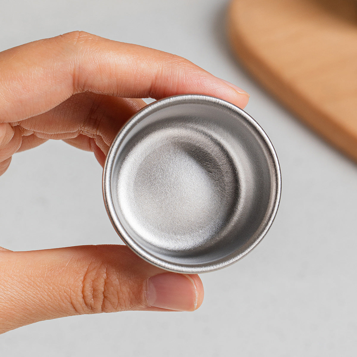 Top view of the smooth interior of a KEITH Ti1161 titanium mini container