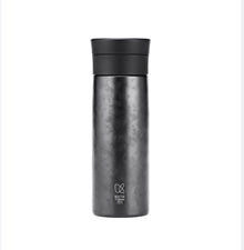 Black Keith Titanium Ti3132 hammered vacuum bottle with black lid on a white background