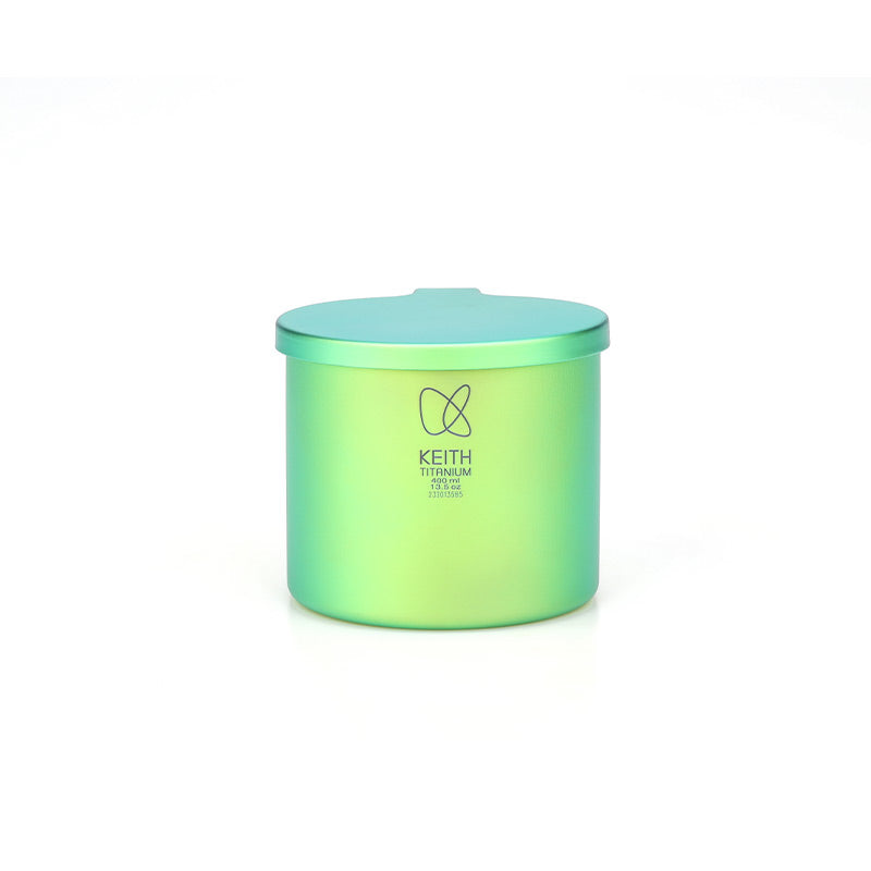 Keith Titanium spring green radiant spectrum cup with lid on a white background