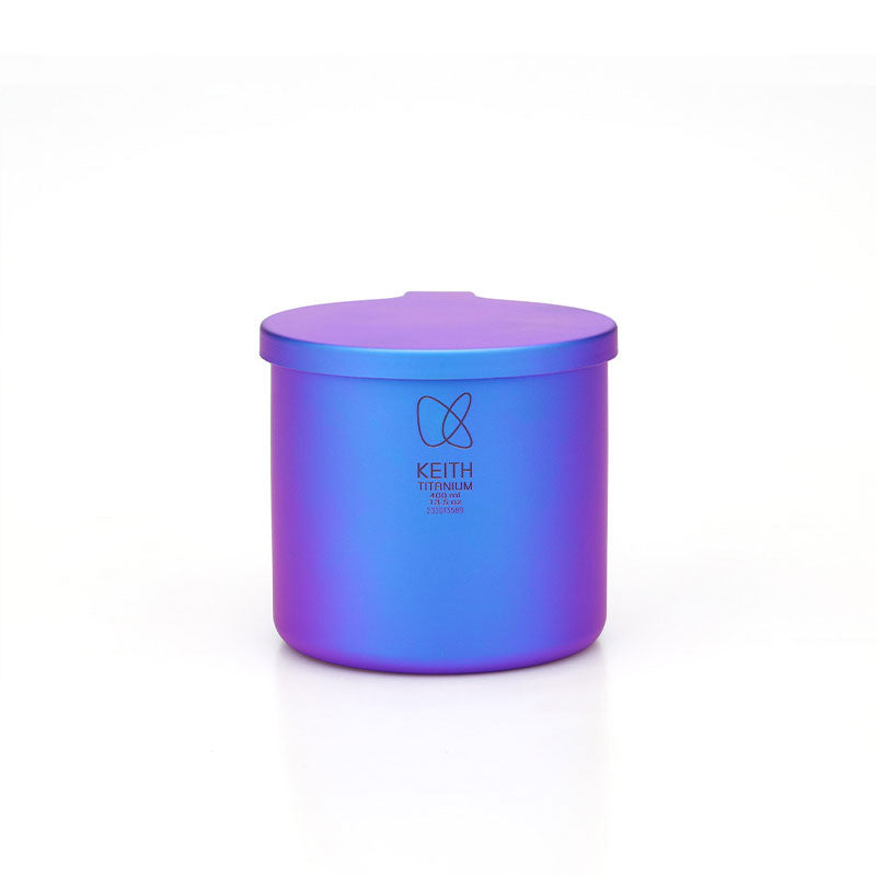 Keith Titanium marine blue radiant spectrum cup with lid on a white background