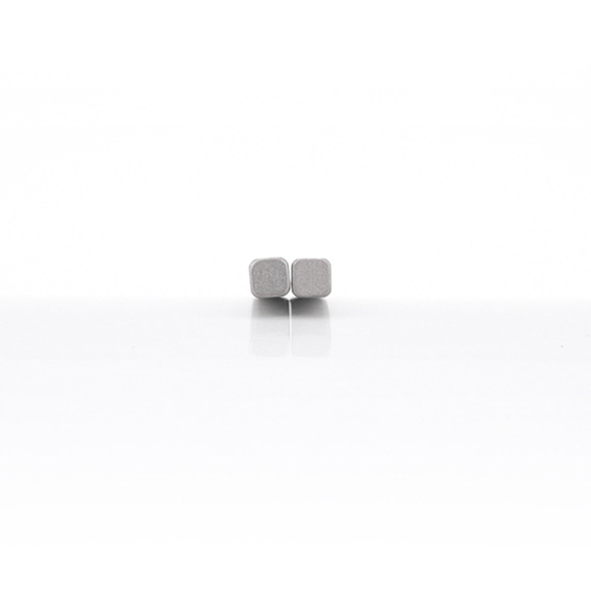 End view showing the square cross section of Keith Titanium Ti5633 chopsticks