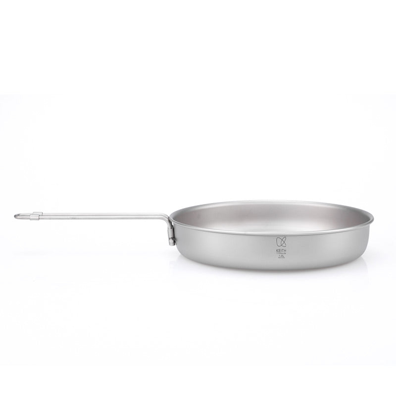 Side view of the Keith Titanium Ti6034 fry pan with the folding handle extended