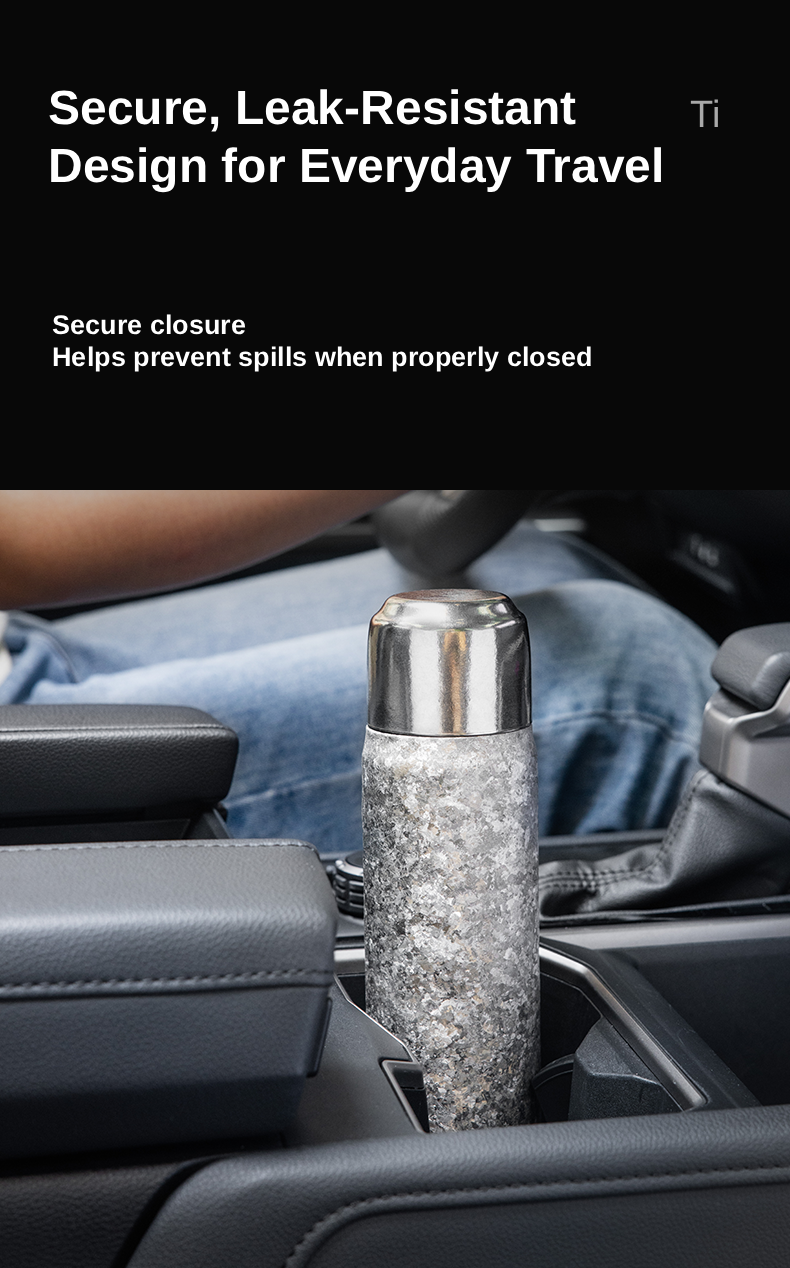 KEITH Ti3107 titanium vacuum bottle standing in a car cup holder with a leak-resistant travel closure