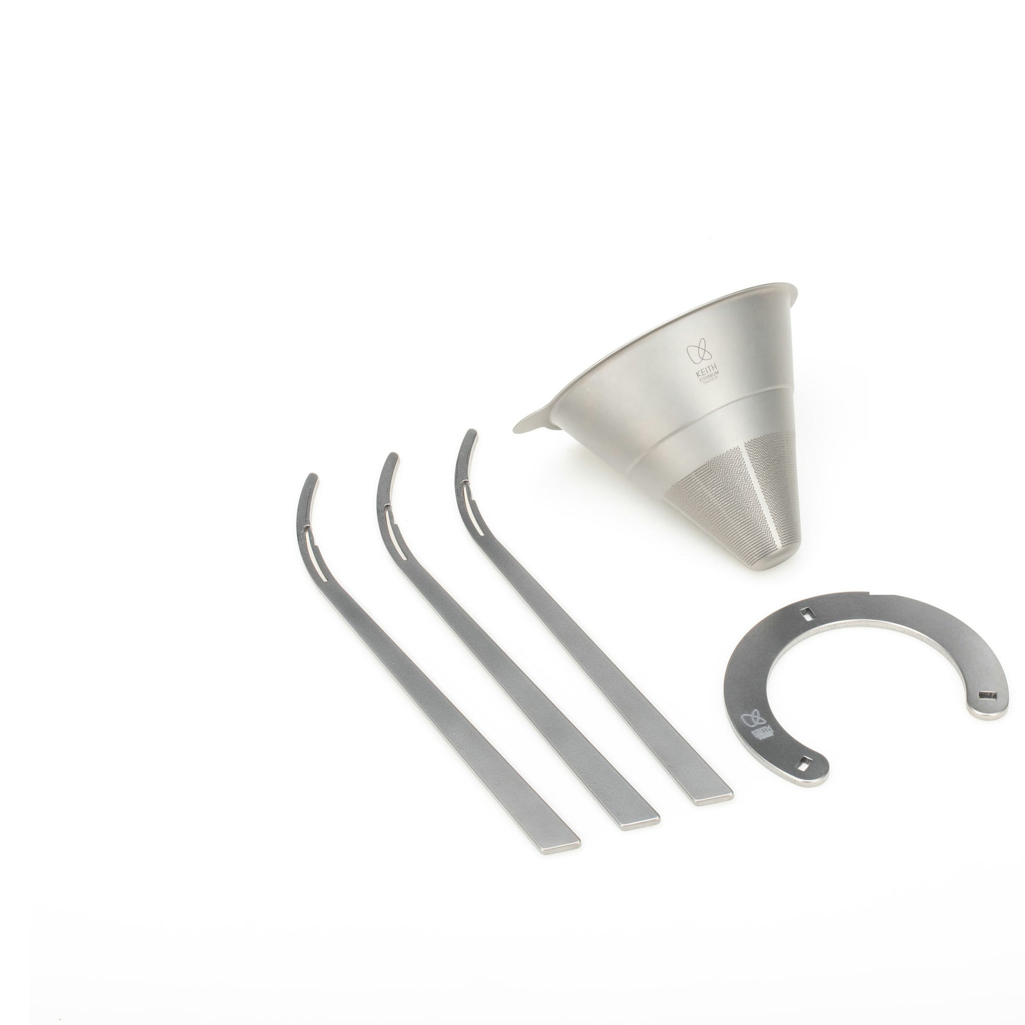 Disassembled KEITH Ti3613 titanium filter and three-leg pour-over stand on a white background