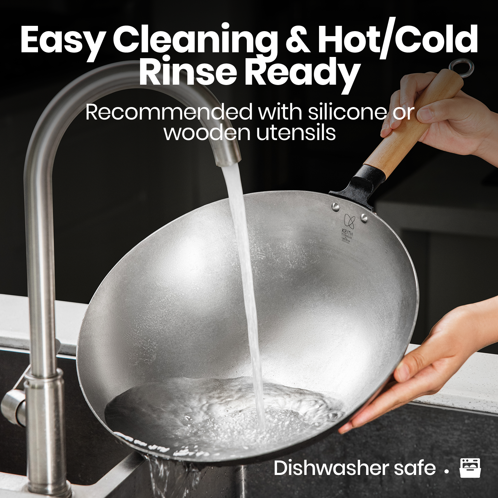 KEITH Ti8127 titanium wok being rinsed by hand under a kitchen faucet