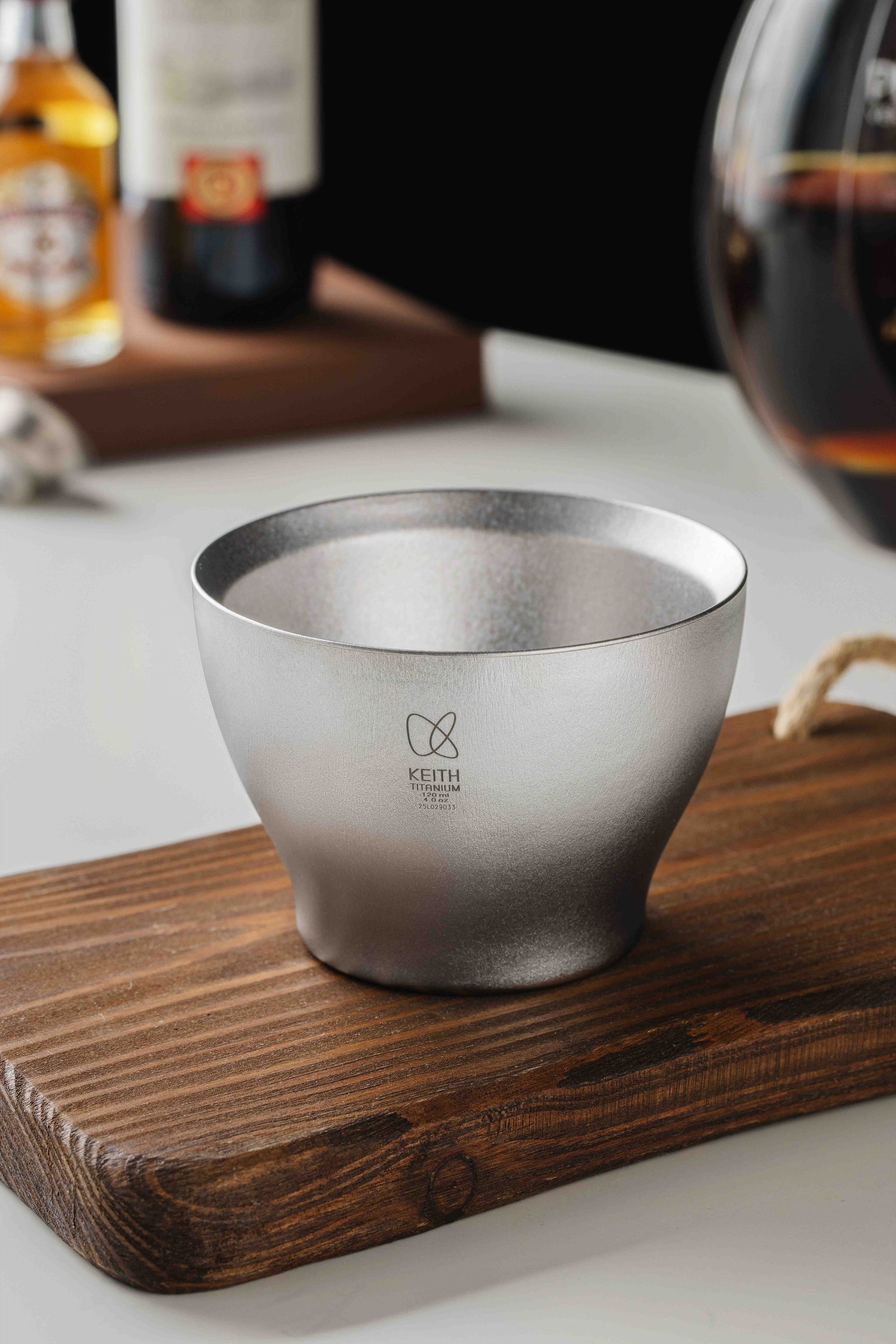Keith Titanium Ti3909 Huaiyue cup on a wooden tray
